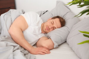 Man asleep on pillow