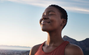 calm woman breathing outdoors