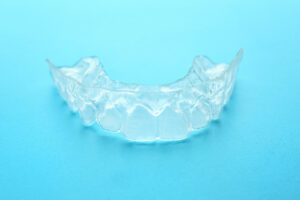 Occlusal splint on color background