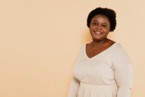 Woman in pastel on beige background