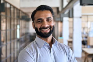 Bearded businessman smiling